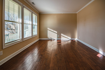 Brown Wooden Parquet Tiled Empty Room