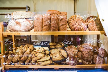 Brown Wooden Rack With Baked Bread Displayed