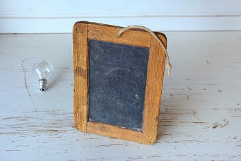 Brown Wooden Rectangular Photo Frame on White Wooden Table