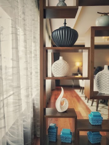 Brown Wooden Shelf With Vase Decors