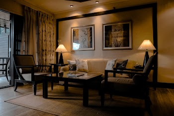 Brown Wooden Sofa Set With Lighted Table Lamp