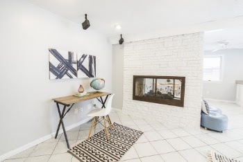 Brown Wooden Table Near Wall