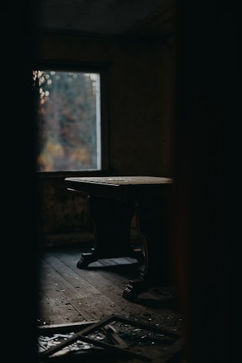 Brown Wooden Table Near Window