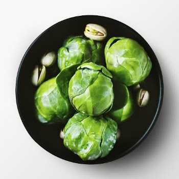 Brussels sprouts in bowl, food | Free PSD - rawpixel