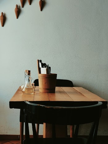 Bucket of Utensils on Table