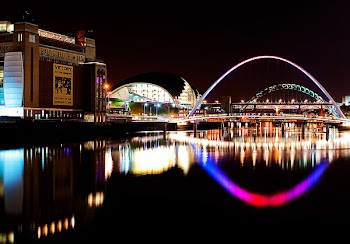 Building Beside Bridge at Night