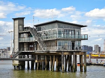 Building on Body of Water Near Dock