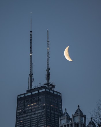 Building Under Crescent Moon