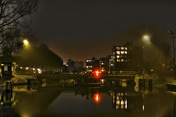 Buildings Near Light Post during Night Time