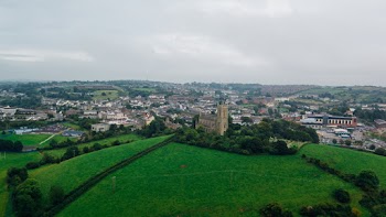 Buildings Near Open Field