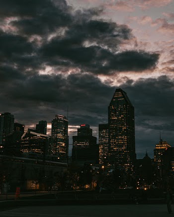 Buildings Under Cloudy Sky