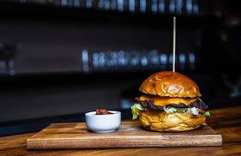 burger with meat and lettuce
