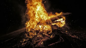 Burning Twigs and Wood Plank