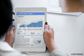 Business analysis chart on digital tablet