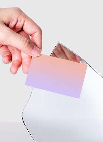 Business card held by hand in front of mirror… | Free stock photo | High Resolution image