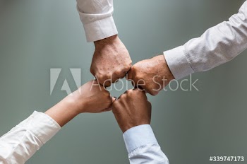 Business hands joined together teamwork