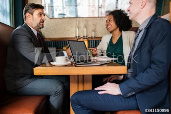 Business meeting at a cafe