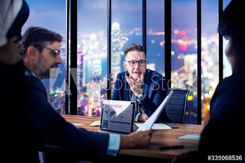 Business meeting at night