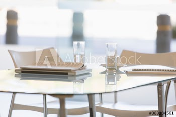 Business paperwork and laptop on office table