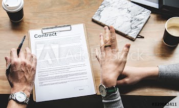 Business people discussing a contract