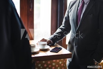 Business people having coffee at a cafe