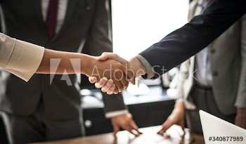 Business people shaking hands in a meeting room