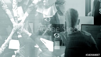 Business people stacking their hands