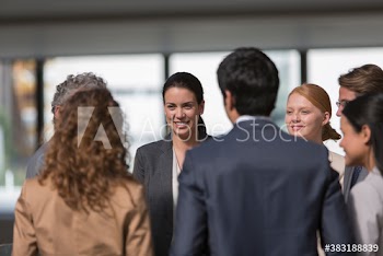 Business people talking in circle