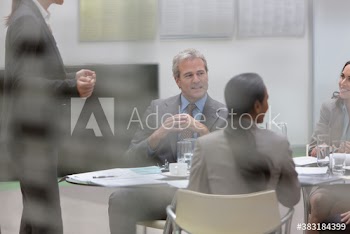 Business people talking in conference room meeting