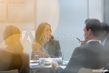 Business people talking in conference room meeting