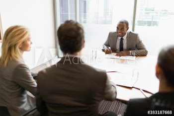 Business people talking in conference room meeting