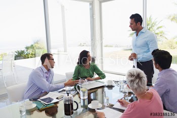 Business people talking in conference room meeting