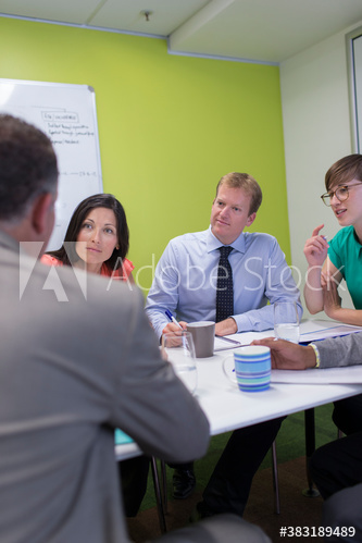 Business people talking in conference room meeting