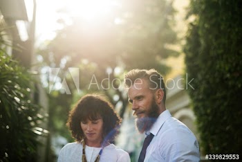 Business people talking together in the park
