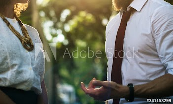 Business people talking together in the park