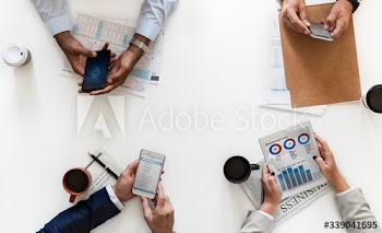 Business people using digital devices