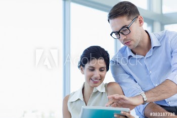 Business people using digital tablet