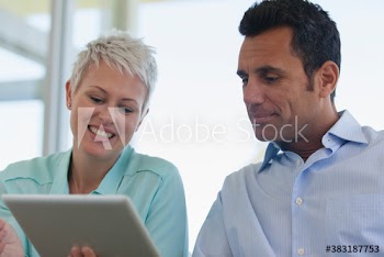 Business people using digital tablet
