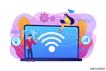 Business people using laptop and smartphone with WiFi connection