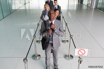 Business people waiting in queue