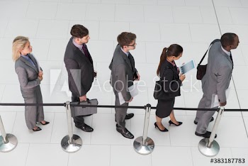 Business people waiting in queue