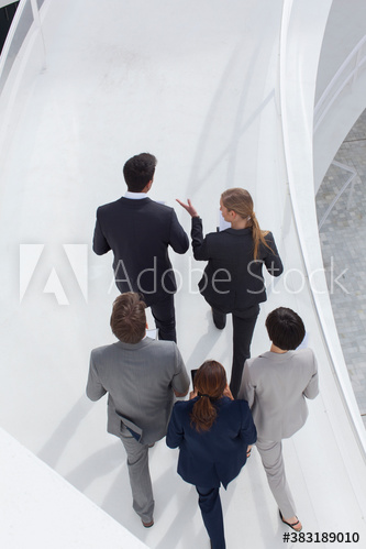 Business people walking on ramp