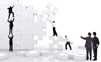 business team work building a puzzle isolated over a white background