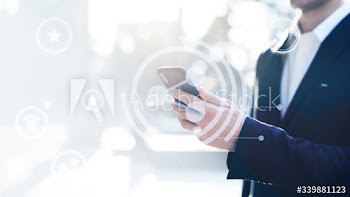 Businessman checking his phone