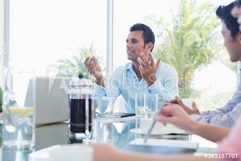Businessman explaining in meeting