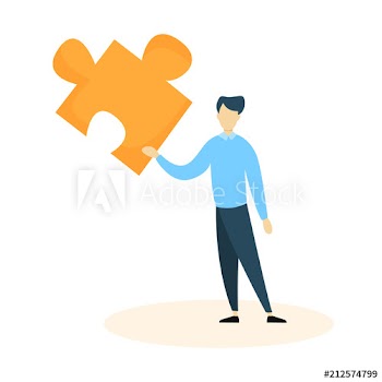 Businessman holding a big yellow puzzle piece