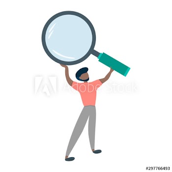Businessman holding a magnifying glass