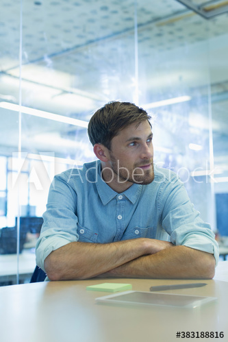 Businessman looking away in office