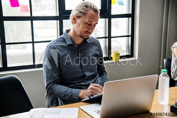 Businessman noting down