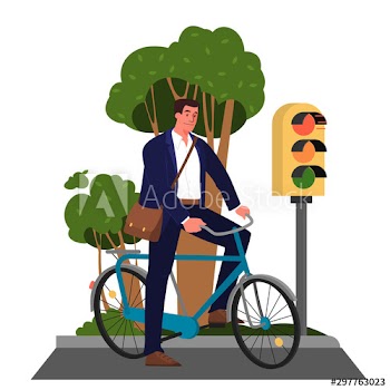 Businessman riding a bicycle in the city